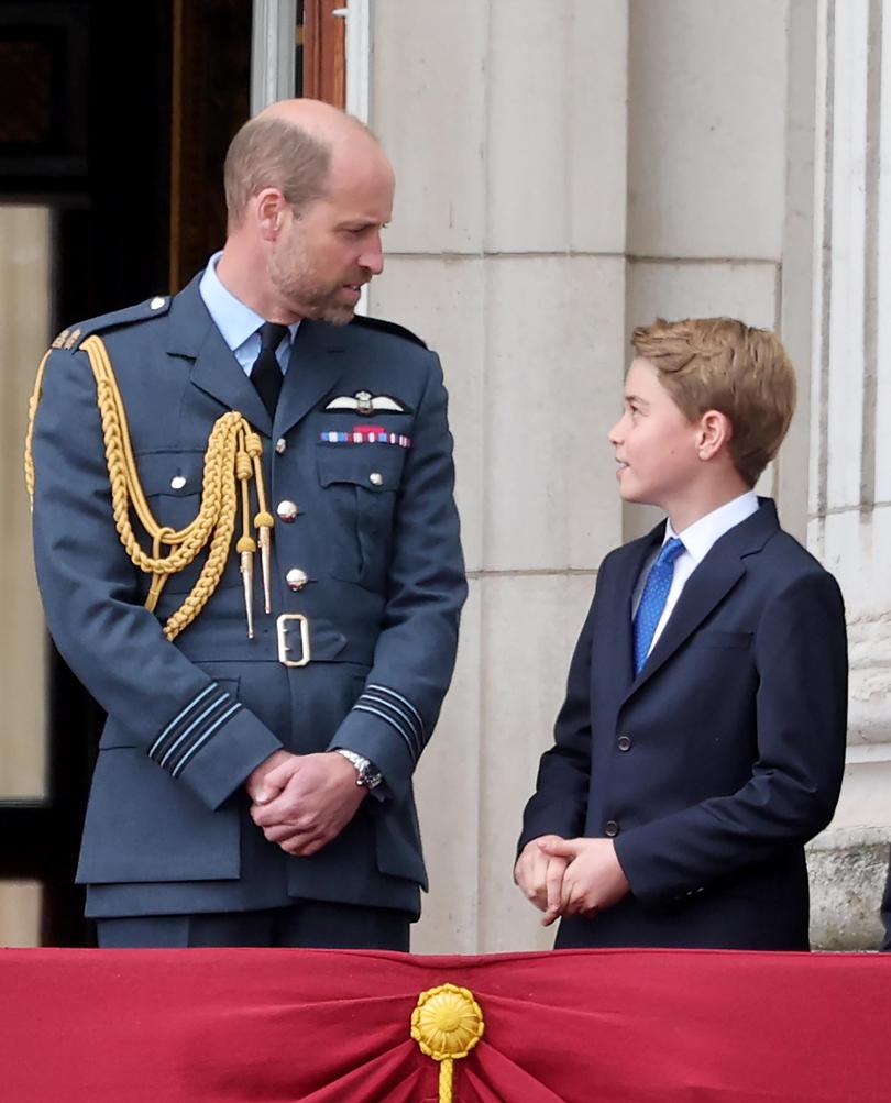 Prince William and Prince George sharing a sweet moment at the parade.