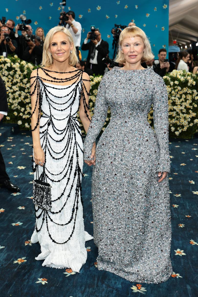 (L-R) Tory Burch and Pamela Anderson attend the 2025 Met Gala Celebrating "Superfine: Tailoring Black Style" at Metropolitan Museum of Art.