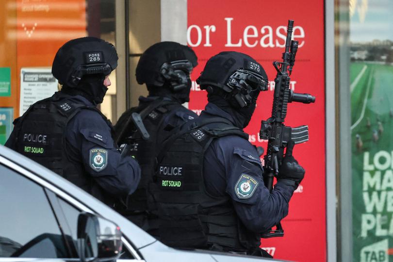 Police enter the Westfield Bondi Junction shopping mall after the stabbing spree.