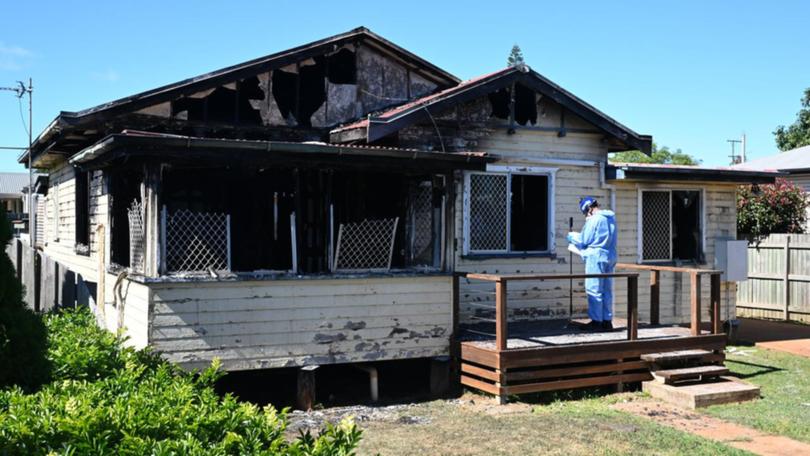 A forensic examination is identifying remains found after a fatal fire in Queensland. (Darren England/AAP PHOTOS)