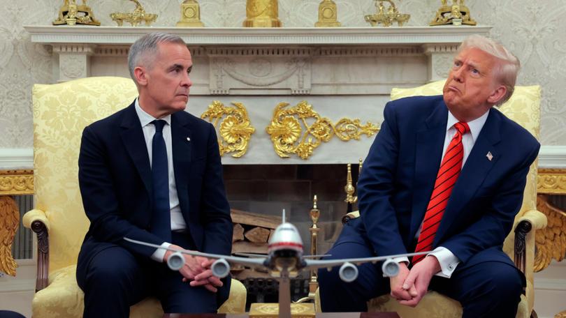 Donald Trump meets with Canadian Prime Minister Mark Carney in the Oval Office.