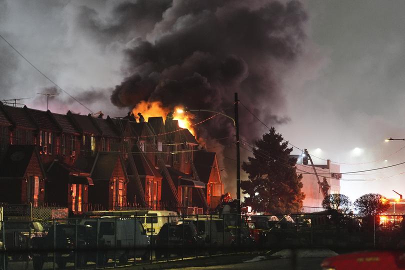 First responders work the scene after a small plane crashed in Philadelphia, Friday, Jan. 31, 2025.