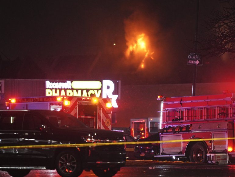 First responders work the scene after what witnesses say was a plane crash in Philadelphia, Friday, Jan. 31, 2025. (AP Photo/Matt Rourke)