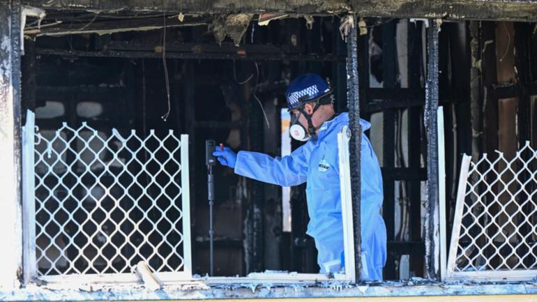 Three children died in the blaze, which police are treating as suspicious.  (Darren England/AAP PHOTOS)