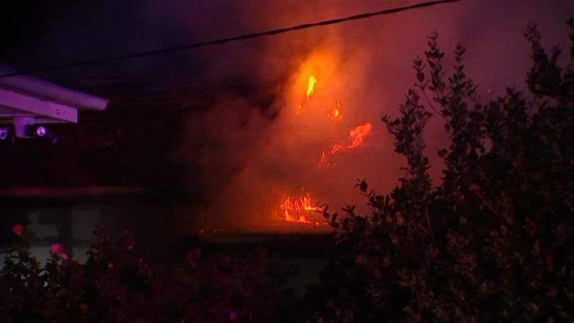 Strong flames engulfed the house just after midnight on Wednesday morning.