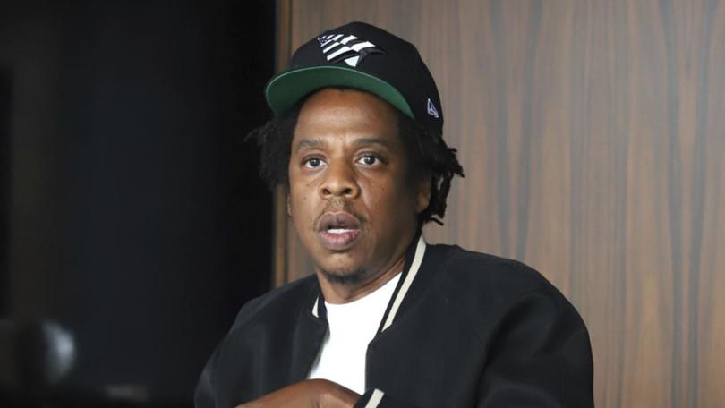 Rapper Jay-Z also alleges his rape accusation has harmed his ability to pursue new opportunities.