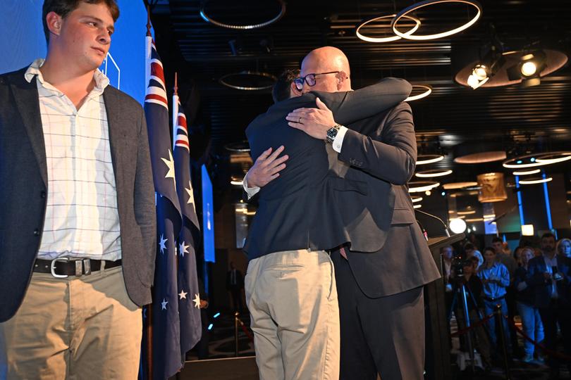 Peter Dutton embraces his son after conceding defeat on Saturday.