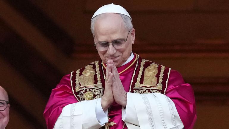The newly elected Pontiff, Pope Leo XIV is seen for the first time from the Vatican balcony.