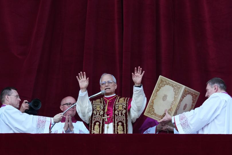 VATICAN CITY, VATICAN - MAY 8: The newly elected Pontiff, Pope Leo XIV is seen for the first time from the Vatican balcony on May 8, 2025 in Vatican City, Vatican. White smoke was seen over the Vatican early this evening as the Conclave of Cardinals took just two days to elect Cardinal Robert Francis Prevost, who will be known as Pope Leo (Leone) XIV, as the 267th Supreme Pontiff after the death of Pope Francis on Easter Monday. (Photo by Christopher Furlong/Getty Images)