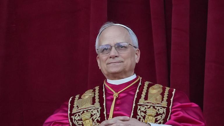 The newly elected Pontiff, Pope Leo XIV is seen for the first time from the Vatican balcony.