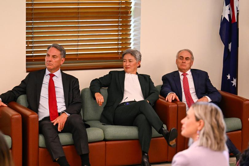 Richard Marles, Penny Wong and Don Farrell attend caucus.