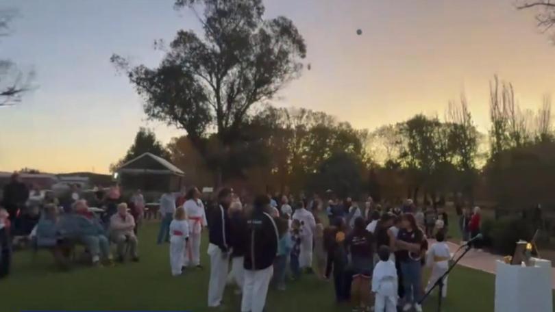 A vigil was held for brother Max Johnson, 7, and Sam, 6, in Coonbarabran after they were allegedly killed by their grandmother.