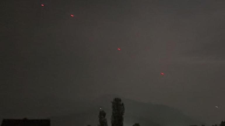 Red projectiles were seen over Srinagar, in Indian-controlled Kashmir, after a ceasefire took hold.