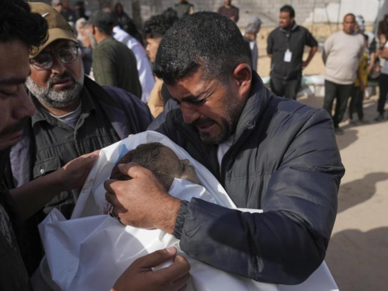 Two children were among those killed in an Israeli air strike in Khan Younis, in southern Gaza. (AP PHOTO)