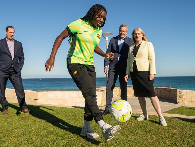 Deputy Premier Rita Saffioti & Minister Reece Whitby announce upcoming Matildas matches for WA: Theo Mouithys shows off her skills to Football West CEO Jamie Harnwell as well as Saffioti and Whitby. Michael Wilson