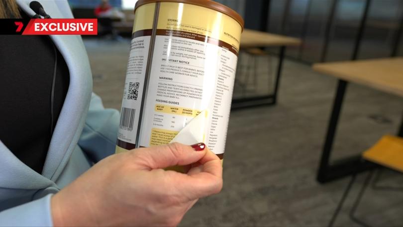 Tins of the formula now have a sticker covering old feeding guide measurements.