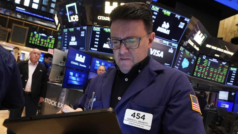 All S&P 500 sub-sectors of Wall Street except utilities were higher at the end of trading. (AP PHOTO)