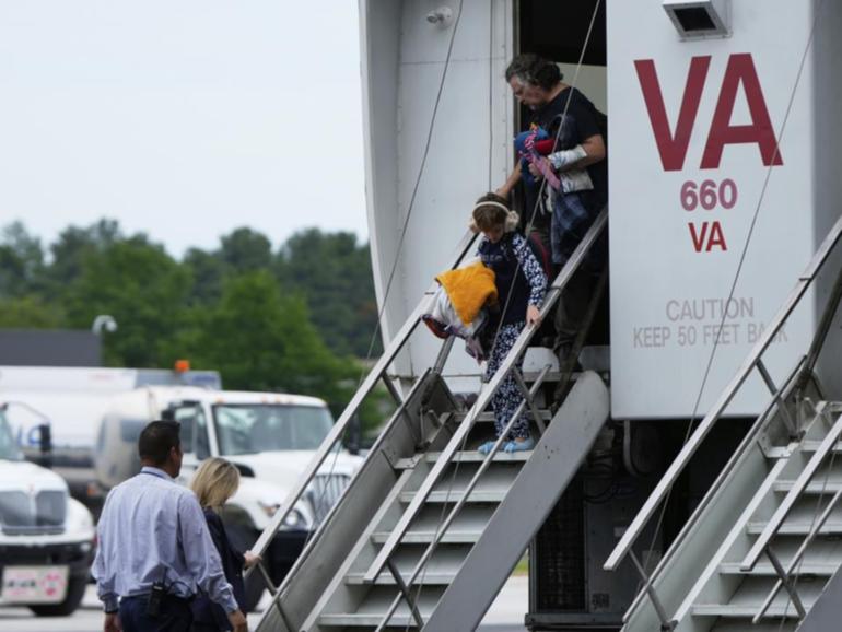 Refugees have arrived in the US from South Africa over what President Donald Trump calls genocide. (AP PHOTO)