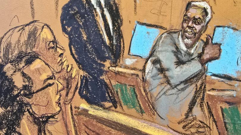 Sean "Diddy" Combs reacts to his family members seated in the audience at his sex trafficking trial in New York City.