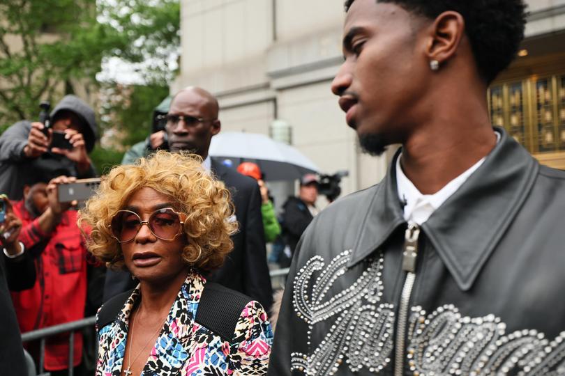 Janice Combs, mother of Sean "Diddy" Combs, and King Combs, son of Sean "Diddy" Combs, leave for the day during Combs' trial at Manhattan Federal Court on May 13.