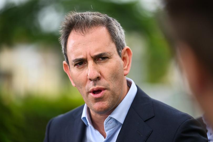 Federal Treasurer Jim Chalmers during a press conference in Brisbane, discussing wages growth data.