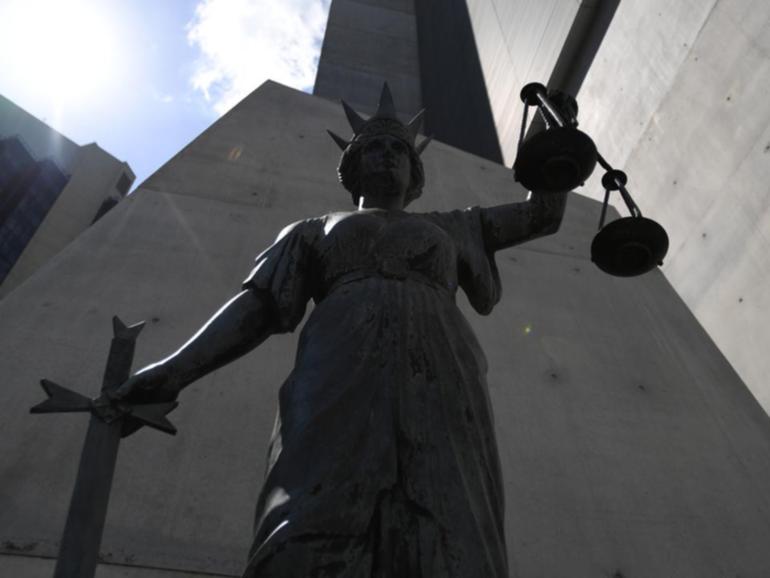A con man has been jailed after posing as a builder and swindling almost $500,000 from victims.
