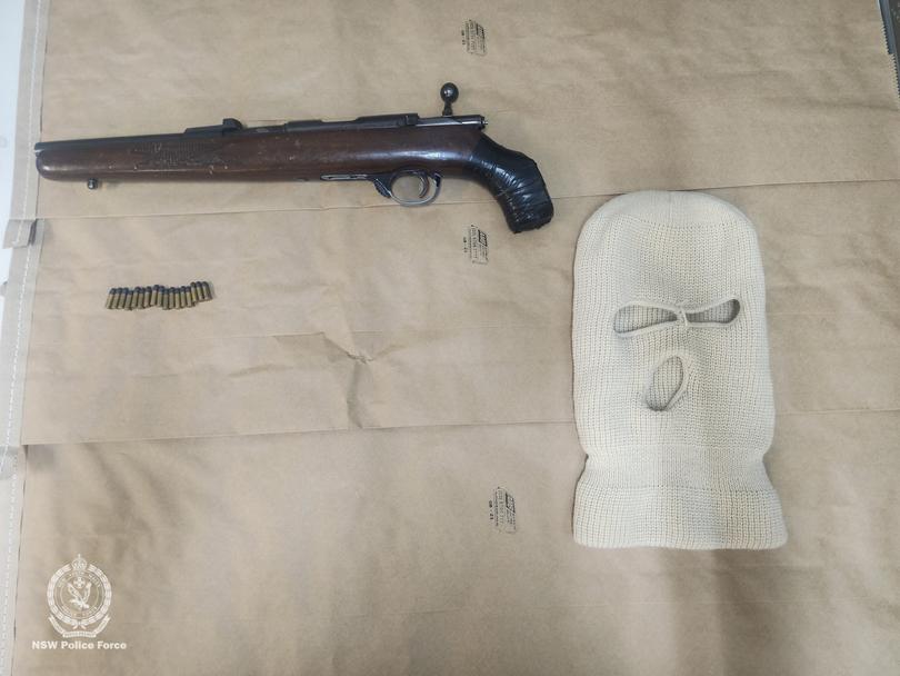 During a search of the car, police found a sawn-off .22 rifle, ammunition, a balaclava, gloves, and cannabis.