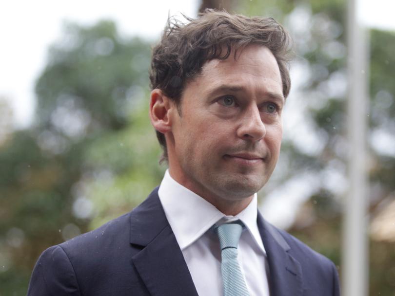 Nick McKenzie leaves the Federal Court in Sydney.