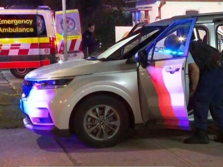 A crime scene has been established after two men were violently stabbed in Sydney.