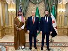 Donald Trump (C) meets with new Syrian Leader Ahmed al-Sharaa (R) and Saudi Crown Prince Mohammed bin Salman (L)