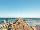 A man has been rushed to hospital in a serious condition after being attacked by a shark off the coast of South Australia. 