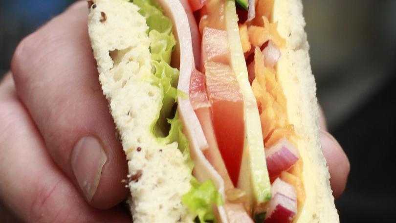 South Australia will ban advertisements for unhealthy foods, including processed meats like ham, on its public transportation assets from July. Supplied