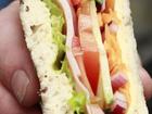 South Australia will ban advertisements for unhealthy foods, including processed meats like ham, on its public transportation assets from July. Supplied
