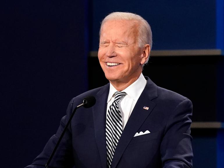 Democratic presidential candidate former Vice President Joe Biden smiles during the first presidential debate Tuesday, Sept. 29, 2020, at Case Western University and Cleveland Clinic, in Cleveland, Ohio. 