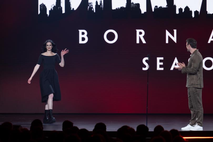 Krysten Ritter joins Daredevil's Charlie Cox on stage to reveal she will reprise the character of Jessica Jones.
