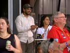 Cyril Rioli applauds a Gold Coast goal in Darwin.