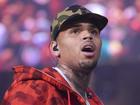 Singer Chris Brown is accused of hitting someone with a bottle at a London nightclub two years ago. (AP PHOTO)