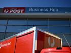 Scam text messages and emails claim an Australia Post delivery failed due to an invalid postcode. (Dan Himbrechts/AAP PHOTOS)