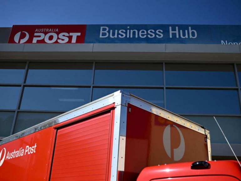 Scam text messages and emails claim an Australia Post delivery failed due to an invalid postcode. (Dan Himbrechts/AAP PHOTOS)