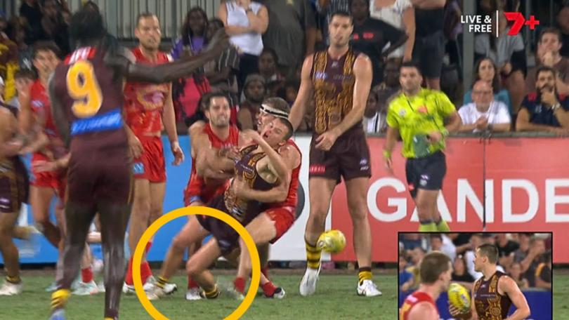 Jack Ginnivan drops his knees and gets a free kick during the clash with Gold Coast.
