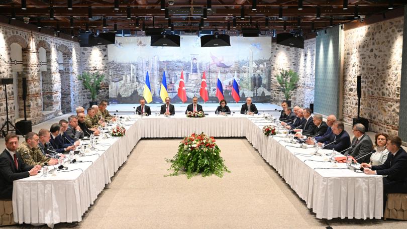 Russian, Turkish and Ukrainian officials during Russian-Ukrainian talks at a presidential office at the Dolmabahce Palace.