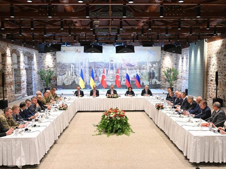 Russian, Turkish and Ukrainian officials during Russian-Ukrainian talks at a presidential office at the Dolmabahce Palace. 