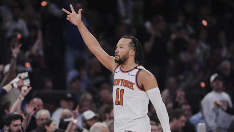 New York Knicks' Jalen Brunson gestures to fans on their way to eliminating the Celtics. (AP PHOTO)