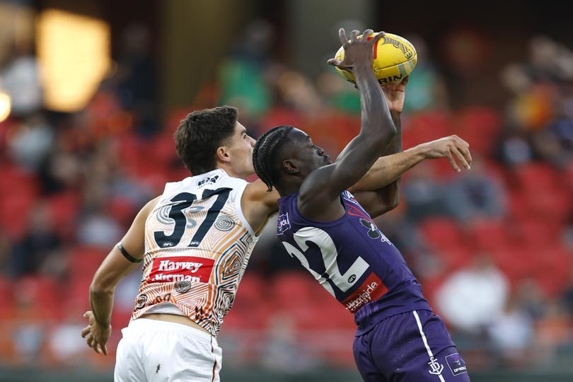 SYDNEY, AUSTRALIA - MAY 17: Michael Frederick of the Dockers marks the ball during the round ten AFL match between GWS Giants v Walyalup (Fremantle Dockers) at ENGIE Stadium, on May 17, 2025, in Sydney, Australia. (Photo by Darrian Traynor/Getty Images via AFL Photos)