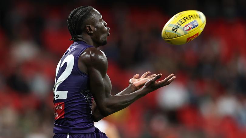 Michael Frederick marks the ball.