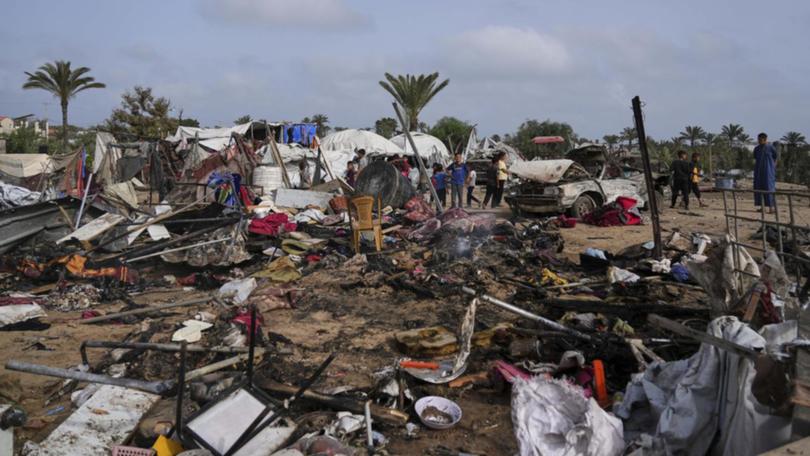 Israeli air strikes on Gaza on Sund haayve killed at least 130 Palestinians, health officials say. (AP PHOTO)