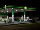 A woman has been attacked with a machete during a terrifying attempted carjacking at a petrol station in Dandenong, Melbourne.