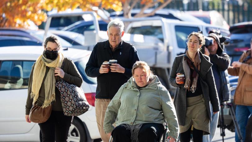 Members of the Wilkinson family, including lunch survivor Ian Wilkinson (centre), attended court on Monday.