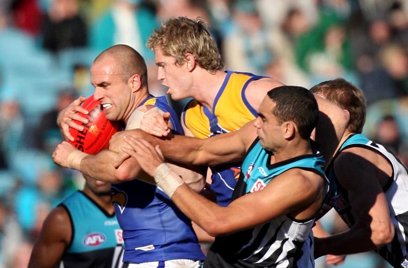 Judd alongside Selwood in a game against Port Adelaide in 2007.