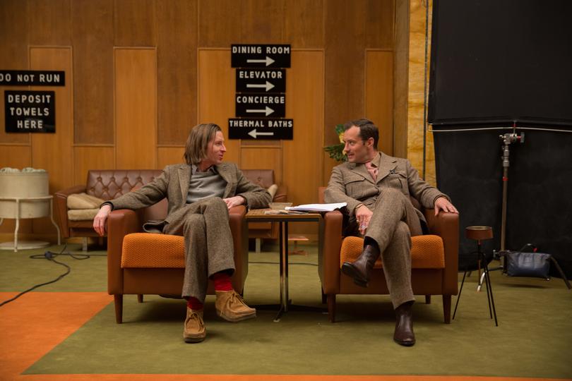Wes Anderson on the set of The Grand Budapest Hotel with Jude Law.